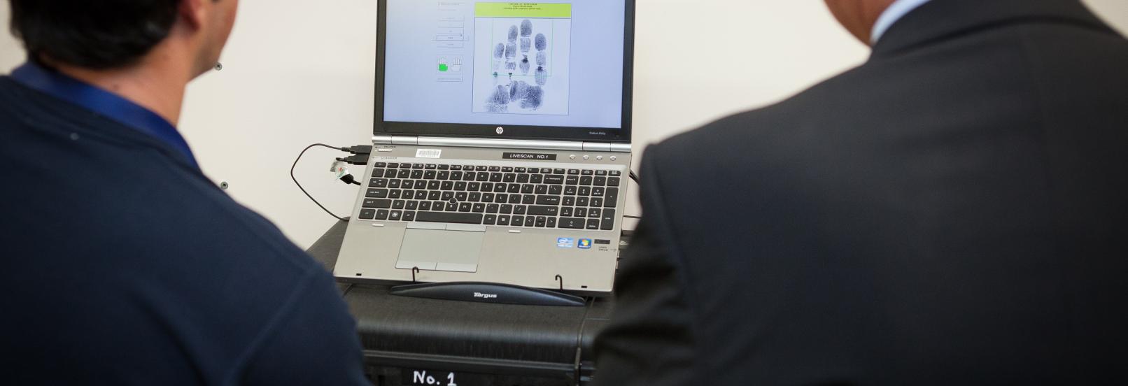 fingerprints on computer screen