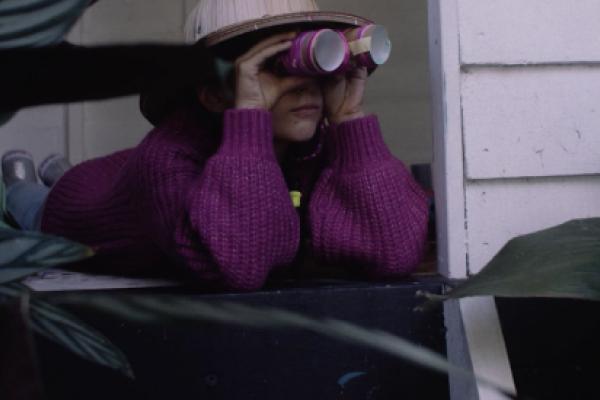 IMCD Cover image girl with pretend binoculars