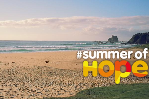 Beach sceen with summer of hope logo